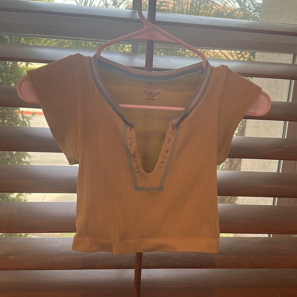 This is a urban outfitters top that was rarely wore and has a good fit and color